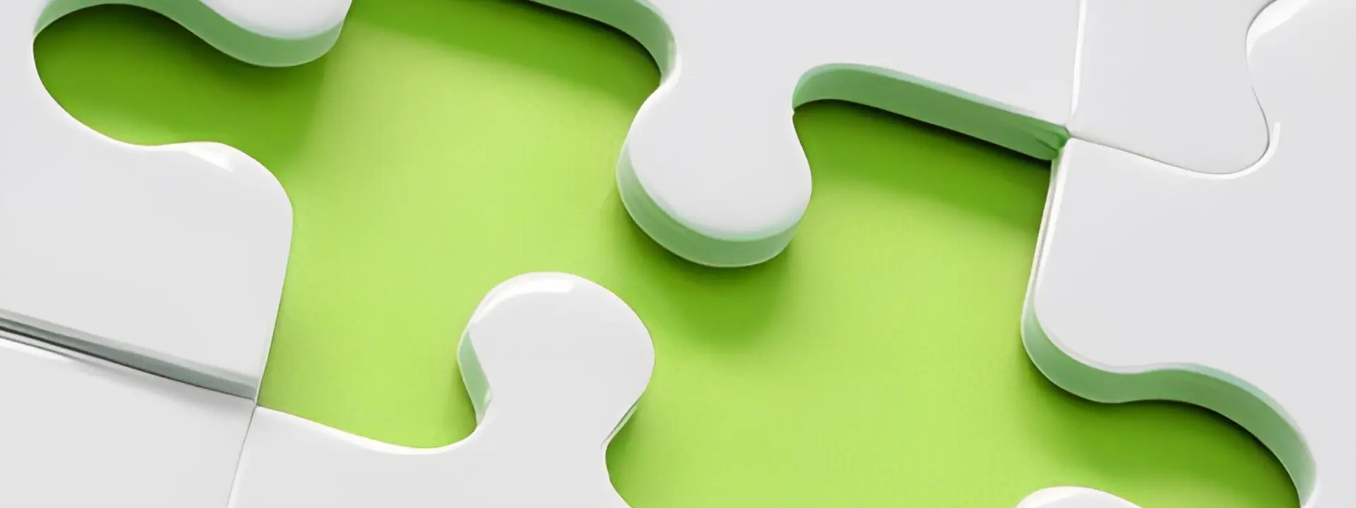A close up of two white pieces of puzzle
