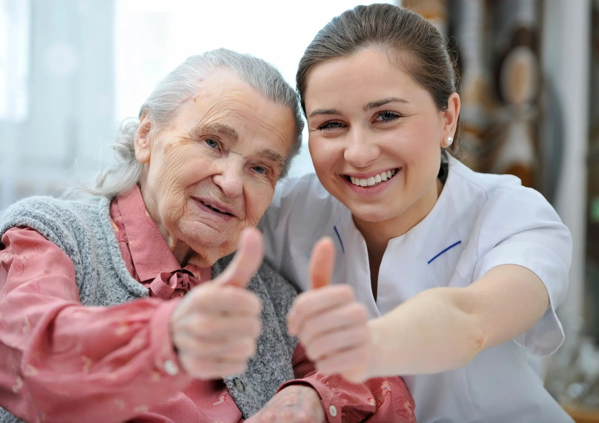 qtq80-1vf6Bf A woman and an old lady giving thumbs up